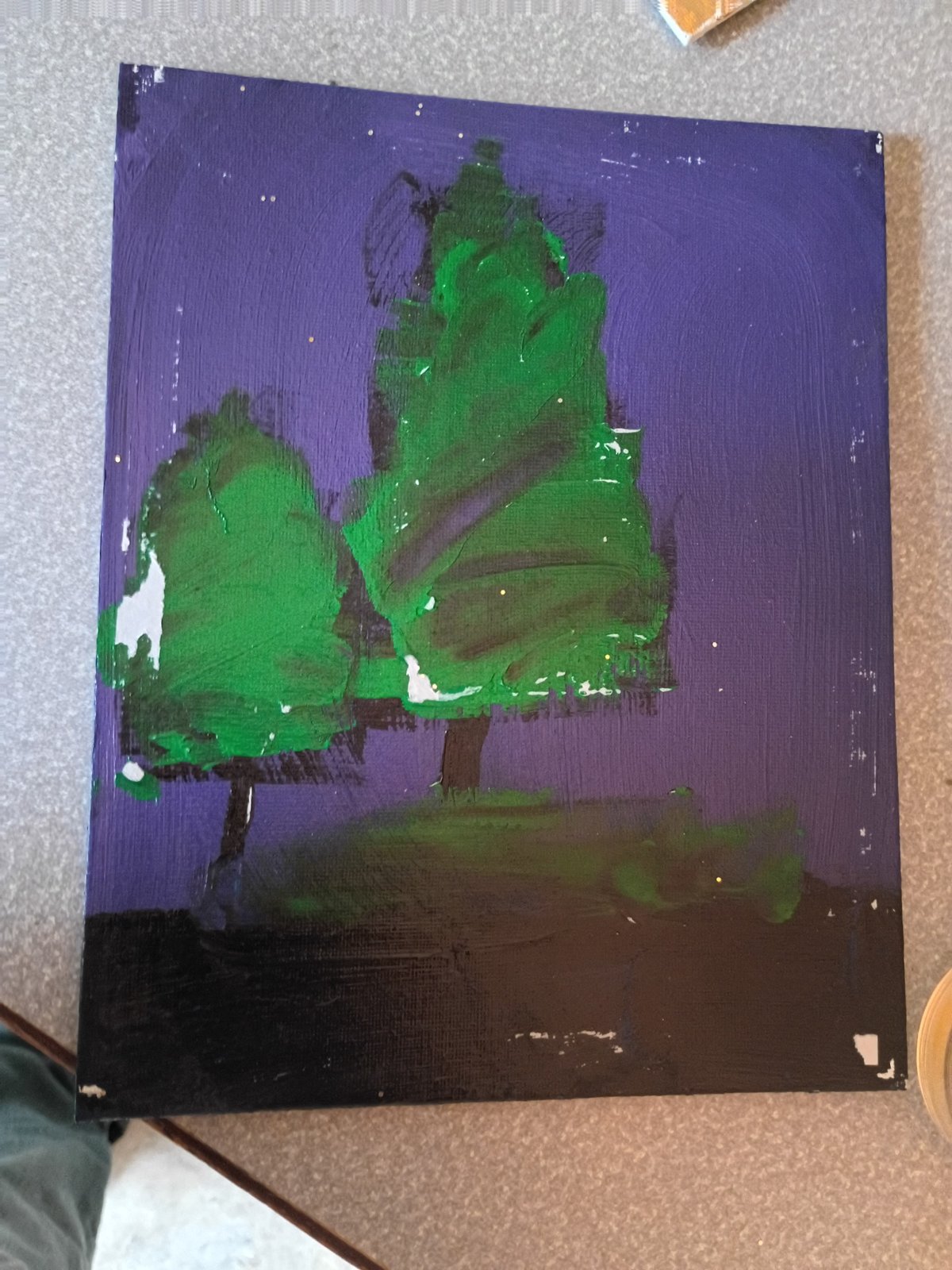 Green trees painted against a purple background